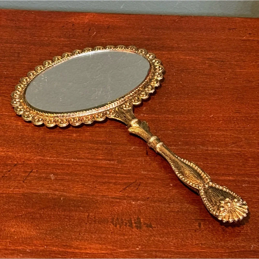 Vintage Gold Tone metal hand held double sided mirror